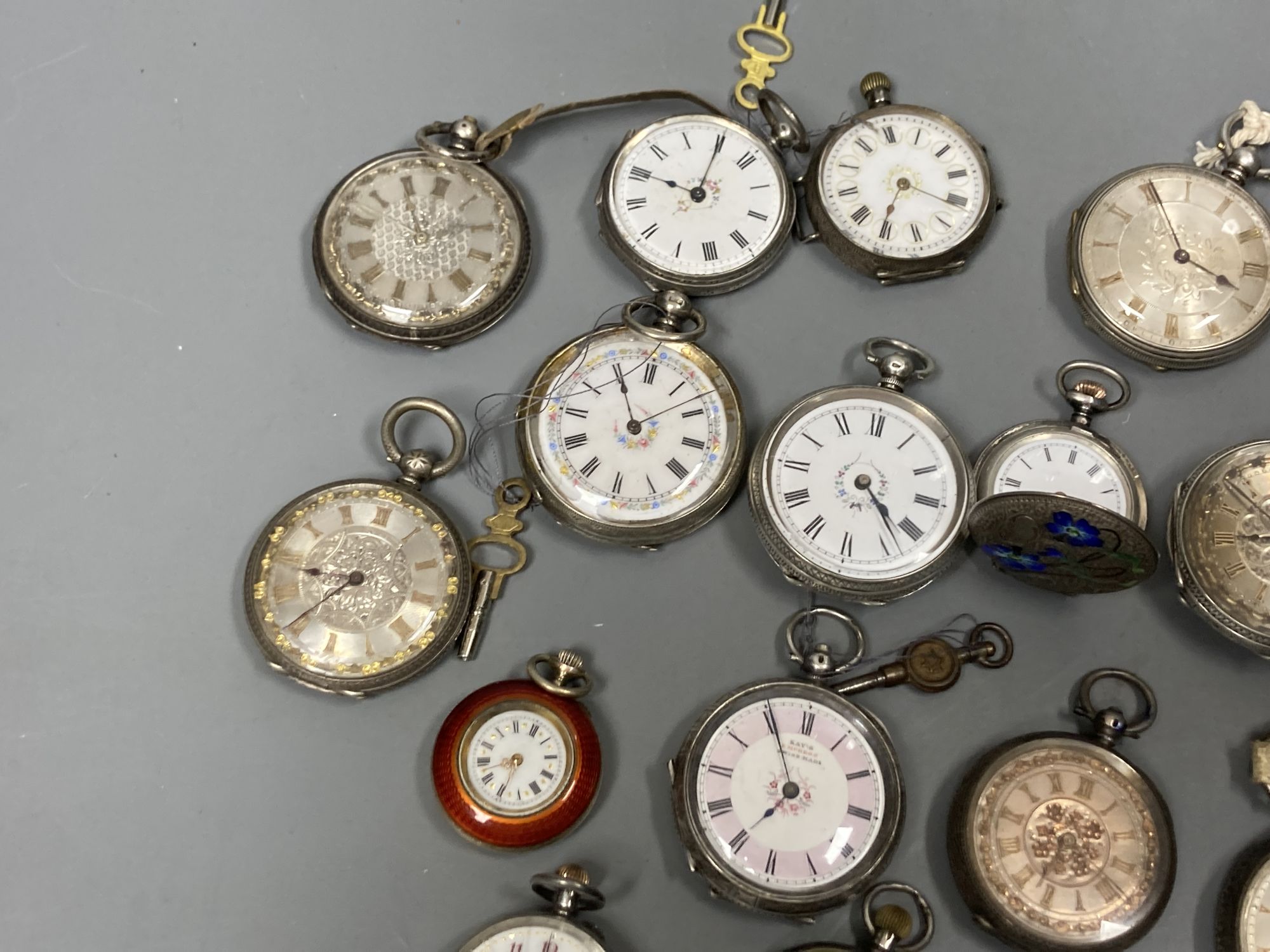 Fifteen assorted early to mid 20th century white metal fob and pocket watches including four with enamel (a.f).